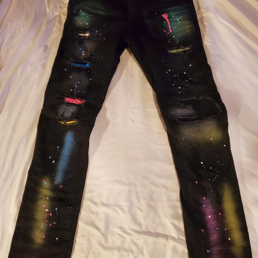 Neon paint splash black skinny jeans